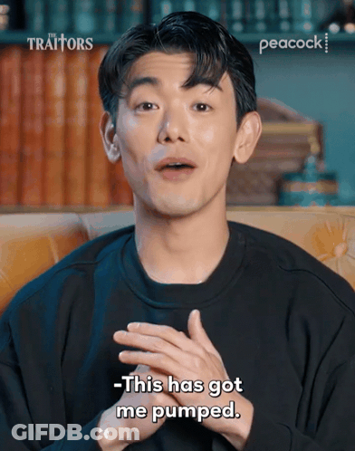 A Man Sitting On A Couch Says This Has Got Me Pumped On Peacock GIF