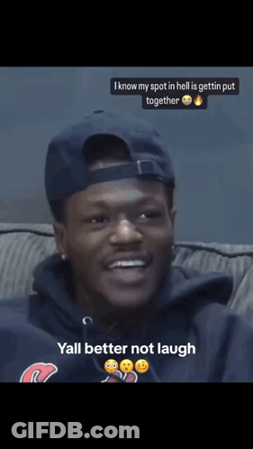 A Man Sitting On A Couch With A Caption That Says " Yall Better Not Laugh " GIF
