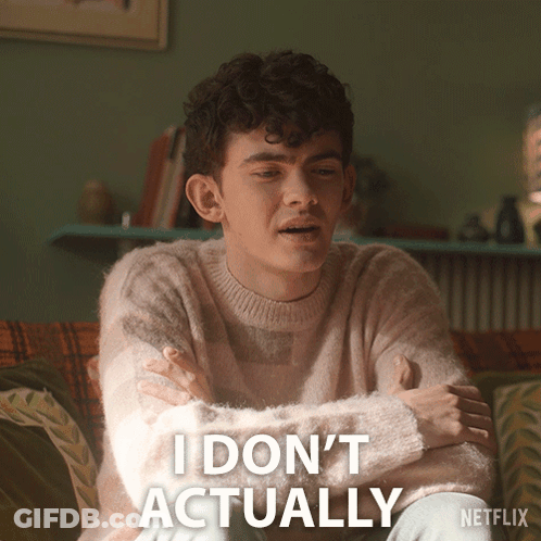 A Man Sitting On A Couch With His Arms Crossed And The Words I Do N't Actually Written Below Him GIF
