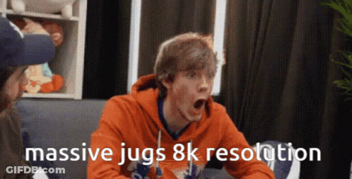 A Man Sitting On A Couch With His Mouth Open And The Words Massive Jugs 8K Resolution GIF
