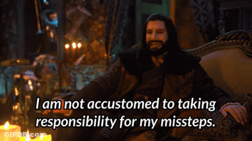 A Man Sitting On A Couch With The Words I Am Not Accustomed To Taking Responsibility GIF