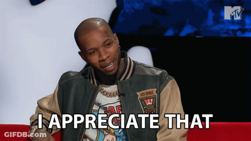 A Man Sitting On A Couch With The Words I Appreciate That Above Him GIF