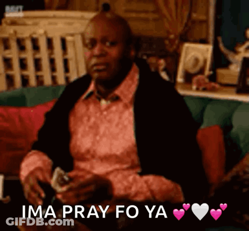 A Man Sitting On A Couch With The Words Ima Pray Fo Ya Written On The Bottom GIF