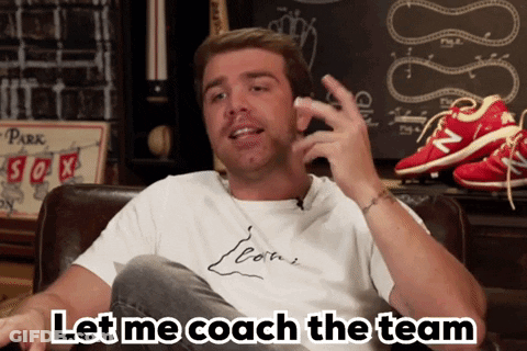 A Man Sitting On A Couch With The Words Let Me Coach The Team Written Below Him GIF