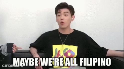 A Man Sitting On A Couch With The Words Maybe We 'Re All Filipino GIF