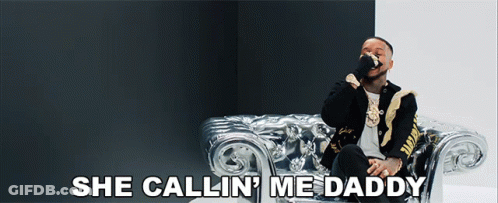 A Man Sitting On A Couch With The Words She Callin ' Me Daddy GIF