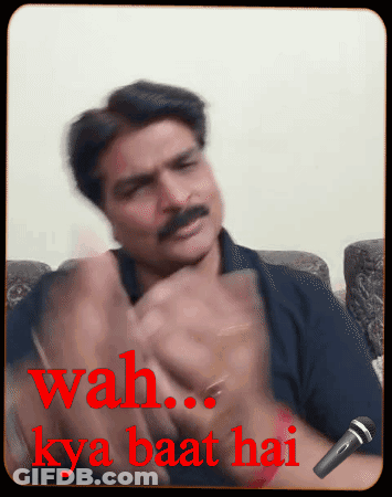 A Man Sitting On A Couch With The Words Wah Kya Baat Hai GIF