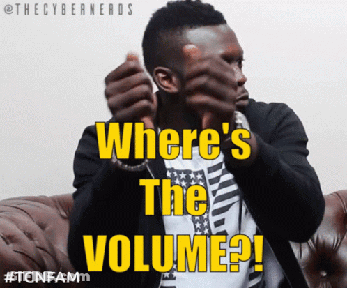 A Man Sitting On A Couch With The Words " Where 'S The Volume " On His Face GIF