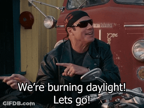 A Man Sitting On A Motorcycle Says " We 'Re Burning Daylight Lets Go " GIF