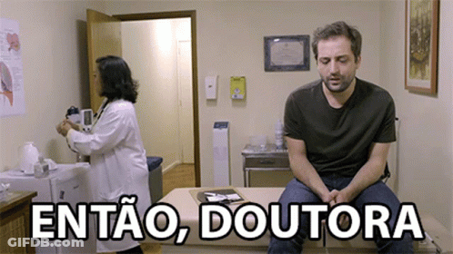 A Man Sitting On A Table With The Words Entao Doutora Written Above Him GIF