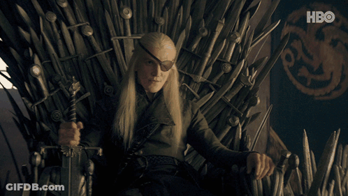 A Man Sitting On A Throne With A Sword And A Hbo Logo In The Background GIF