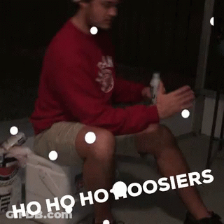 A Man Sitting On A Toilet With The Words Ho Ho Ho Hoosier Written On The Bottom GIF
