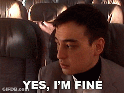 A Man Sitting On An Airplane With The Words Yes I 'M Fine Above Him GIF