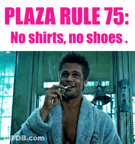 A Man Smoking A Cigarette In Front Of A Sign That Says " Plaza Rule 75 : No Shirts No Shoes " GIF