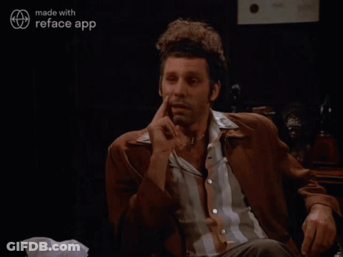 A Man Smoking A Cigarette With The Words That 'S True Behind Him GIF
