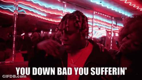 A Man Smoking A Cigarette With The Words You Down Bad You Sufferin ' GIF