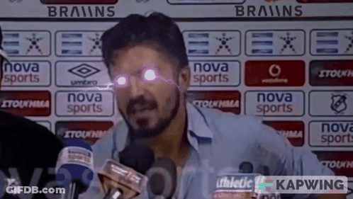 A Man Speaking Into A Microphone In Front Of A Nova Sports Sign GIF