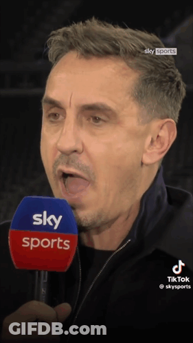 A Man Speaking Into A Microphone That Says Sky Sports On It GIF
