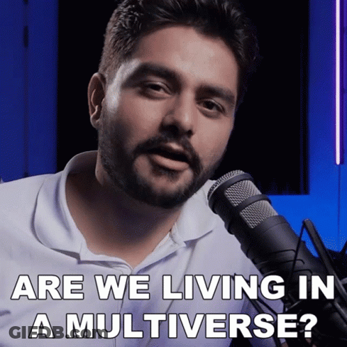 A Man Speaking Into A Microphone With The Words " Are We Living In A Multiverse " Below Him GIF