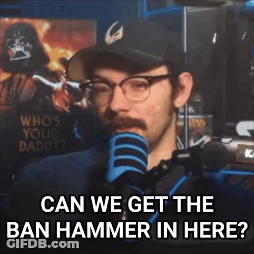 A Man Speaking Into A Microphone With The Words " Can We Get The Ban Hammer In Here " Below Him GIF