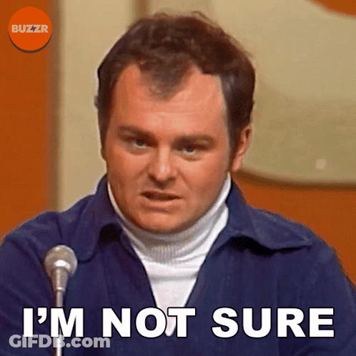 A Man Speaking Into A Microphone With The Words I 'M Not Sure Below Him GIF
