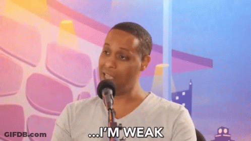 A Man Speaking Into A Microphone With The Words I 'M Weak Below Him GIF