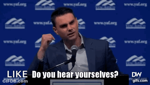 A Man Speaking Into A Microphone With The Words Like Do You Hear Yourselves On The Bottom GIF
