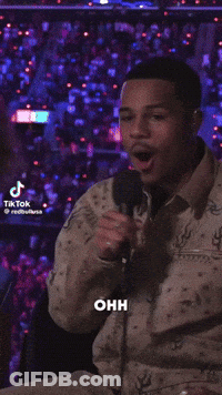 A Man Speaking Into A Microphone With The Words That 'S That On The Bottom GIF