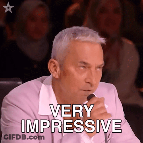 Man Speaking Into Microphone With Very Impressive Text GIF