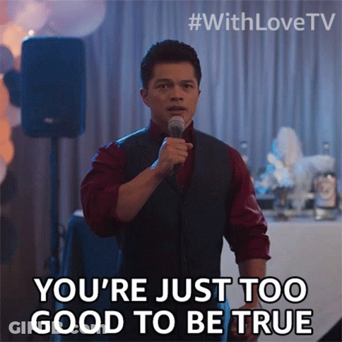 A Man Speaking Into A Microphone With The Words " You 'Re Just Too Good To Be True " GIF