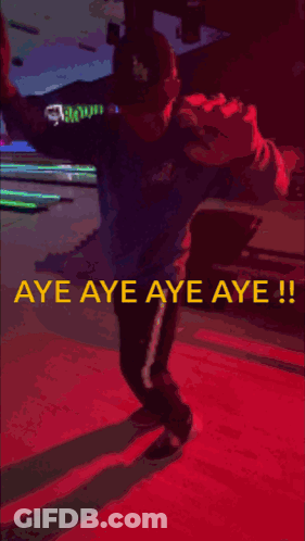 A Man Standing In A Bowling Alley With The Words Aye Aye Aye Aye GIF