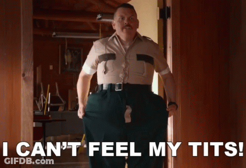 A Man Standing In A Doorway With The Words I Can 'T Feel My Tits Below Him GIF