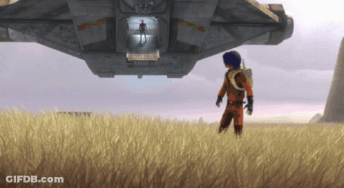 A Man Standing In A Field Looking At A Space Ship That Says ' Rescue ' On It GIF