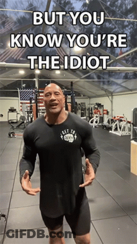 A Man Standing In A Gym With The Words But You Know You 'Re The Idiot On The Bottom GIF