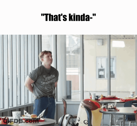 A Man Standing In A Restaurant With The Words " That 'S Kinda " GIF