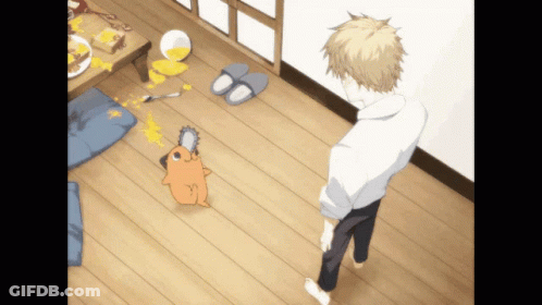 A Man Standing In A Room With A Dog And A Chainsaw GIF