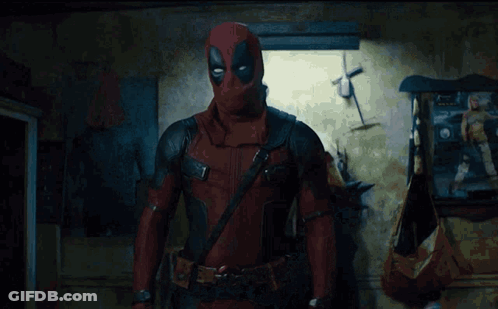 A Man Standing In A Room With Smoke Coming Out Of His Chest GIF