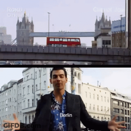 Man Standing In Front Of Berlin Bridge GIF
