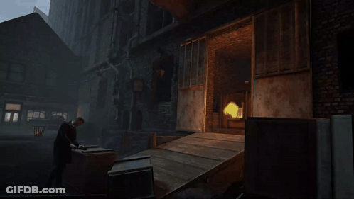 A Man Standing In Front Of A Building With A Fire Coming Out Of It GIF