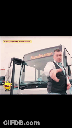 A Man Standing In Front Of A Bus That Says Einsatzwagen GIF