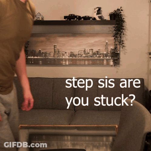 A Man Standing In Front Of A Couch With The Words " Step Sis Are You Stuck " Written On It GIF