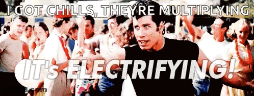 A Man Standing In Front Of A Crowd With The Words Got Chills They 'Re Multiplying It 'S Electrifying ! GIF