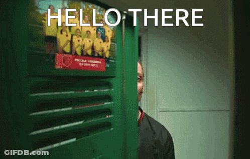 A Man Standing In Front Of A Door That Says Hello There On It GIF