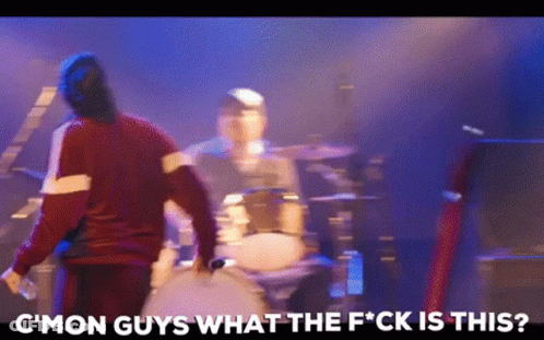 Man Standing By Drum Set With F Word GIF