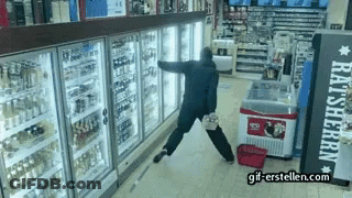 A Man Standing In Front Of A Fridge That Says Rat Sherpa On It GIF