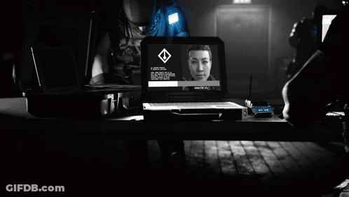A Man Standing In Front Of A Laptop That Says Level 1 On It GIF
