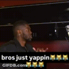 A Man Standing In Front Of A Microphone With The Words " Bros Just Yapping " Written On The Bottom GIF