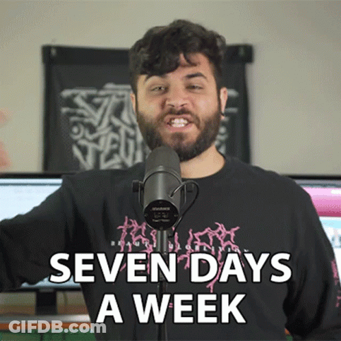 A Man Standing In Front Of A Microphone With The Words Seven Days A Week Written Below Him GIF