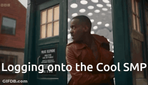 A Man Standing In Front Of A Police Box With The Words Logging Onto The Cool Smf Written Below Him GIF