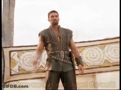 A Man Standing In Front Of A Sign That Says It 'S Been Warriors Who Shaped The World On It GIF